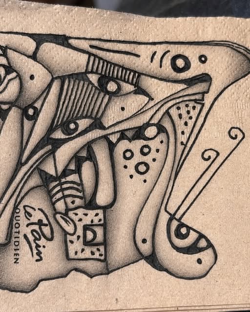 Ink drawing on café napkin